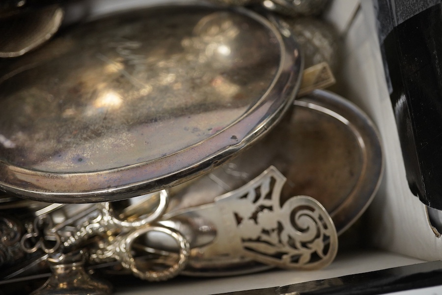 A group of assorted silver etc. including a mounted hand mirror and two brushes, two card cases (both a.f.), caddy spoon, fruit knife, page turners (a.f.), shoe pin cushion, cased folding comb and other mainly damaged it